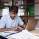Young Indian Business Man Using Laptop Computer Working in Office - VideoHive Item for Sale
