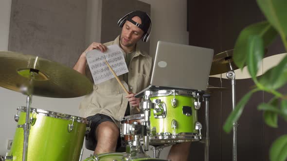 Man Gives Drum Lesson Via Laptop