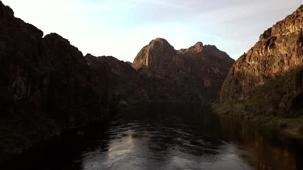 4k Aerial view from drone flying over the Colorado River with views of beautiful red rocks