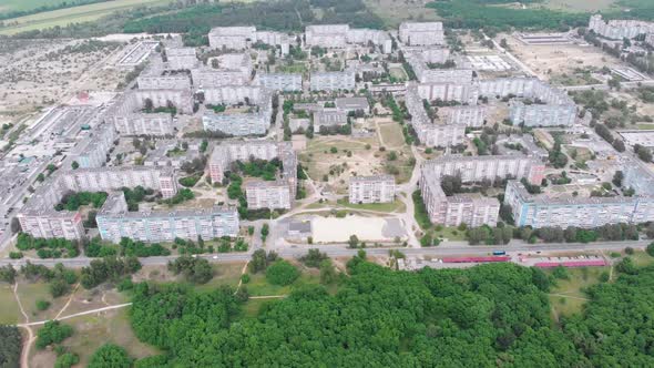 Aerial Panorama on City with Multi-Story Buildings Near Nature and River