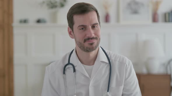 Portrait of Young Doctor Shaking Head As Yes Sign Approval