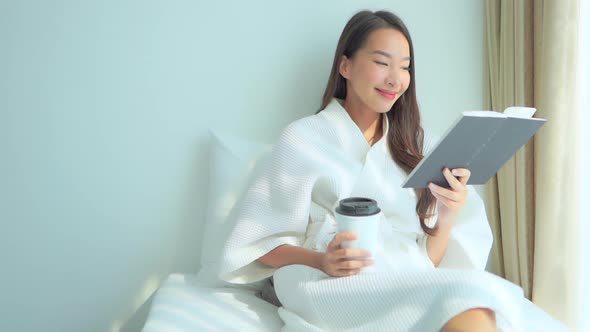 Young asian woman use smart phone in room