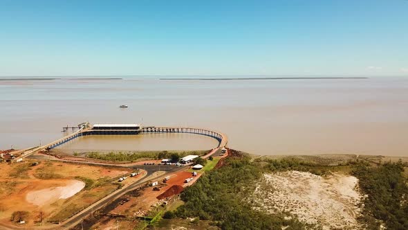 Forward flying drone shot showing Derby Port and Jetty in Western Australia.