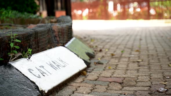 Close-up of a walkway sign in Johannesburg Zoo, South Africa