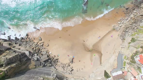 Aerial view of beach and cliffs next to Azenhas do Mar Village.