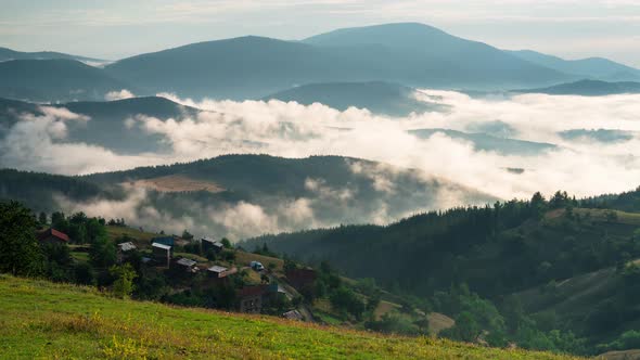 Fast-moving mists over mountain slopes