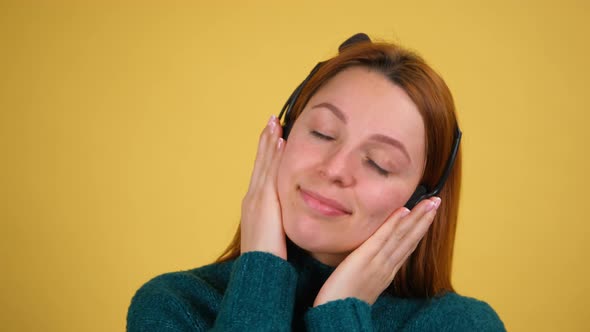 Young Woman Listen Music in Headphones Dancing Fooling Around Have Fun
