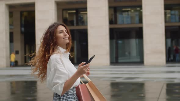 Successful Woman on Walk in City