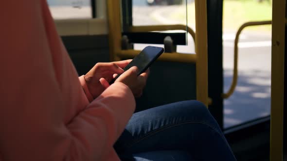 Young woman commuting on a bus