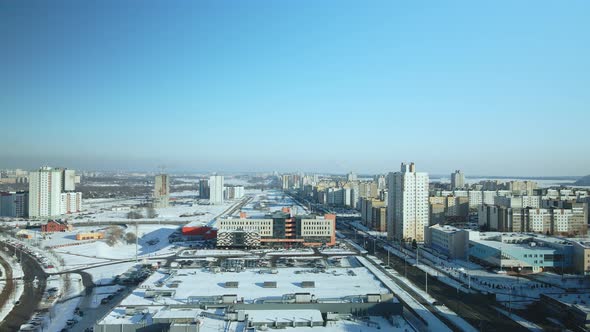 City quarters. Multi-story houses. Winter cityscape.