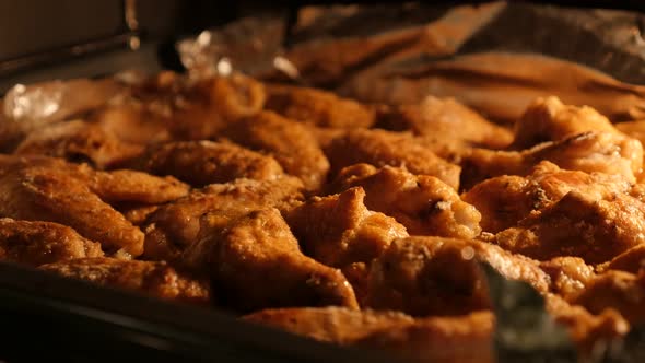 Chicken meat baked and ready to being served close-up 4K 2160p 30fps UltraHD panning footage - Buffa
