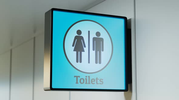 Close-up view at the toilets sign. Airport hall. WC. Restroom. Man. Woman. 4k HD