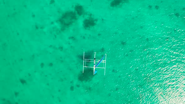 Sailing Boat in Blue Sea alt