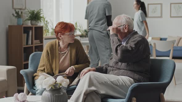 Senior Couple Talking at Nursing Home