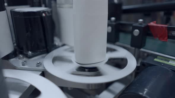 Circling Mechanical Equipment In A Beer Factory Used To Help In Manufacturing Canned Beers