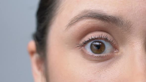 Woman Rising Her Eyebrow