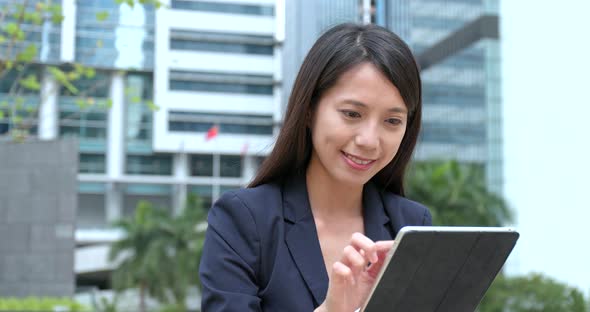 Asian Businesswoman use of tablet computer 