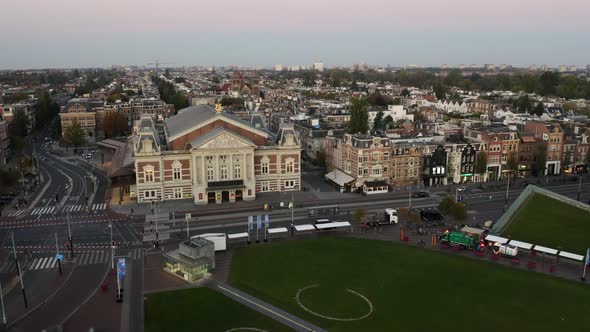 Amsterdam Aerial Sightseeing. Flying Above Old Centre District. Netherlands