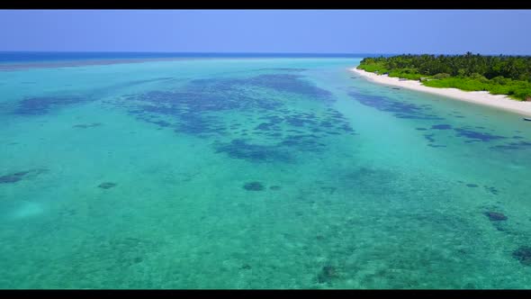 Aerial top view scenery of perfect resort beach trip by blue green water with white sand background 