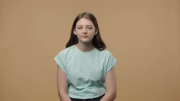 Portrait of Charming Model Looking at Camera with Excitement Then Celebrating Her Victory Triumph