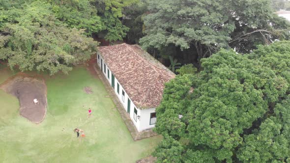 Aerial Flight Of A House On The Forest