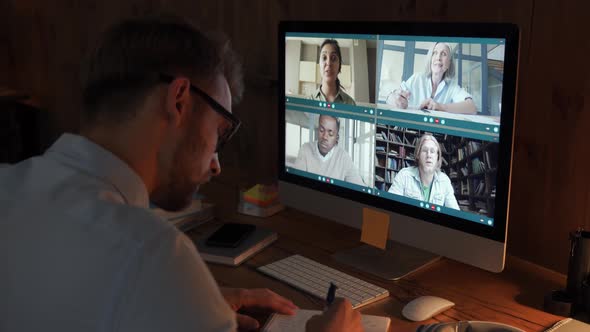 Business Man Talking with Diverse Colleagues in Virtual Video Conference Chat