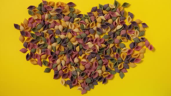 Heart of various colorful Pasta Food cooking healthy eating concept