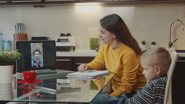 Working at Homeoffice Woman Making Video Call on Laptop with Her Colleague From Other Country