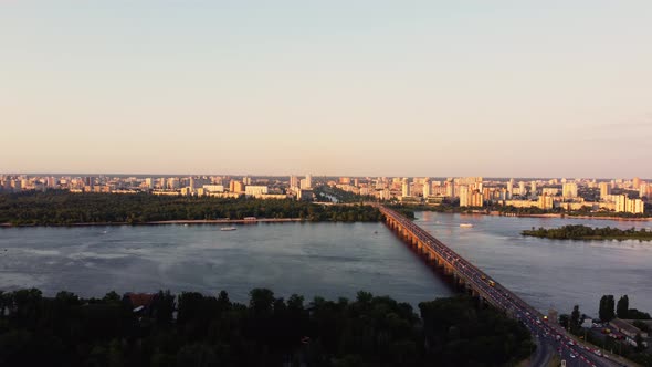 panorama of Kyiv, capital of Ukraine and Dnieper River, day and evening time sunset.
