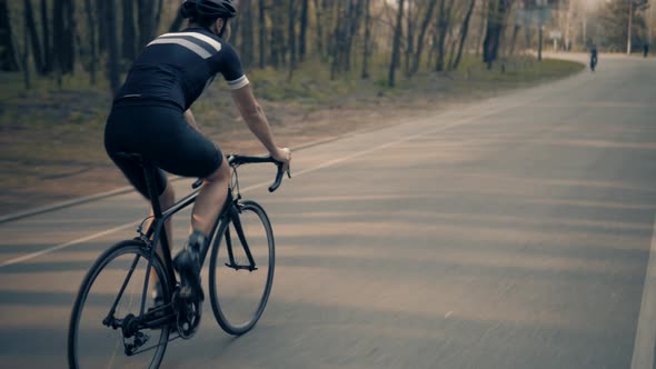 Cyclist Fitness Riding On Road Bike Ready For Triathlon Race.Recreation Sport.Hard Sport Workout.