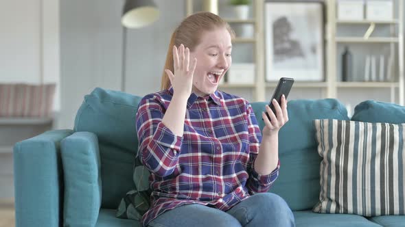 Young Woman Shopping Online on Phone