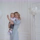 Mother Holding on Hands Infant Small Child - VideoHive Item for Sale