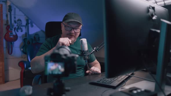 Adult Man In Glasses With Borodai Leads A Live Stream