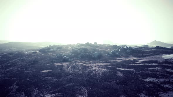 Foggy Mountain Landscape with Snow Cornice Over Abyss Inside Cloud