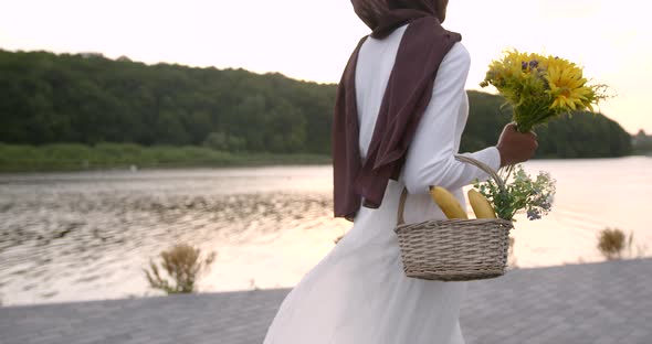 Romantic Black Woman with Basket Walk Near Lake