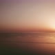Beautiful colorful romantic sunset on the ocean waves with horizon and sea in background - VideoHive Item for Sale