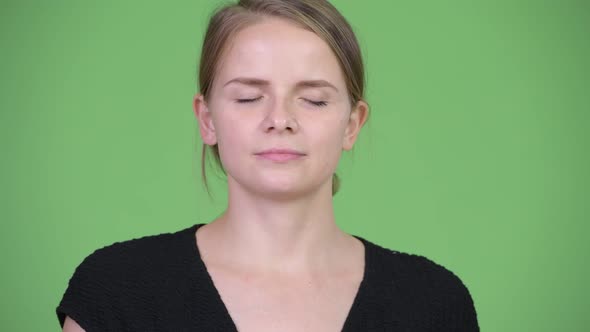 Young Happy Beautiful Businesswoman Relaxing with Eyes Closed