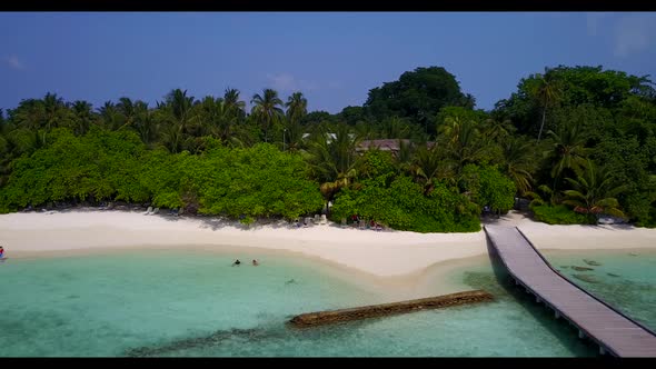 Aerial top view abstract of luxury coastline beach wildlife by blue green lagoon with bright sandy b