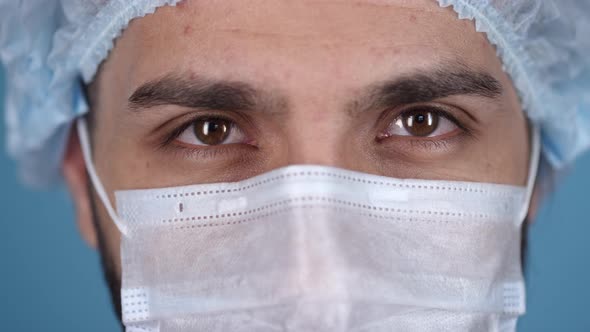 Close Up of Face of Doctor in Mask