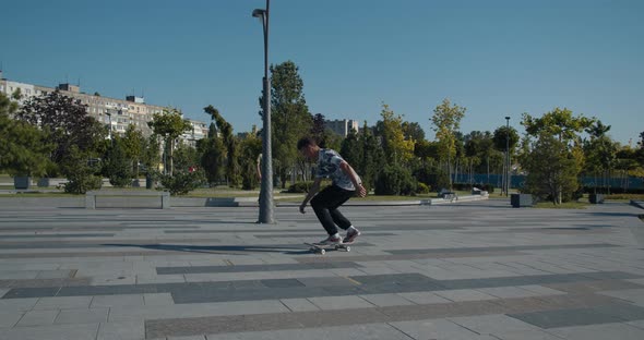 Amazing Kickflip Performed By a Skater Boy at the Skatepark, 
