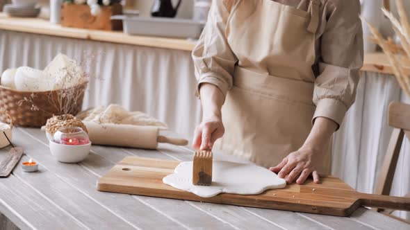 Handcraft Woman Master Modeling Cold Porcelain Hands Makes Pattern and Texture on the Dough Beats It