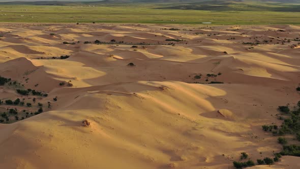 Aerial Top View on Sand Dunes in Desert at Sunset