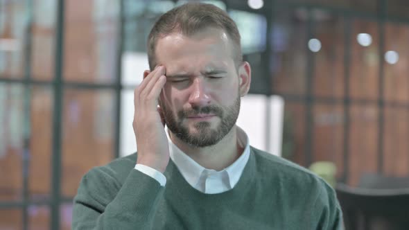 Portrait Shoot of Stressed Man Having Headache