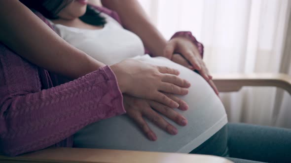 Pregnant Couple Feels Love and Relax at Home