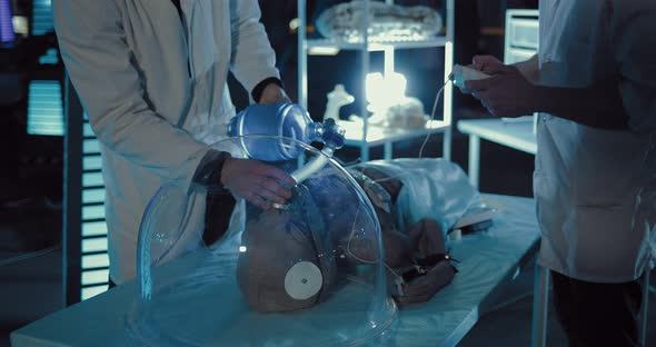 Scientists Have Connected the Alien to the Artificial Respiration Apparatus and Sensors