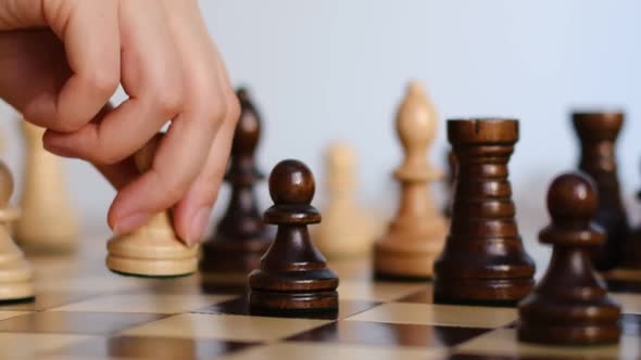 Unrecognizable Woman Playing Chess