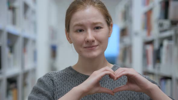 Heart Sign by Young Woman in Love, Hands Gesture