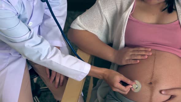 Pregnant Woman and Gynecologist Doctor at Hospital