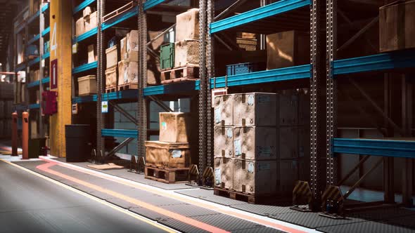 Huge Distribution Warehouse with Boxes on High Shelves