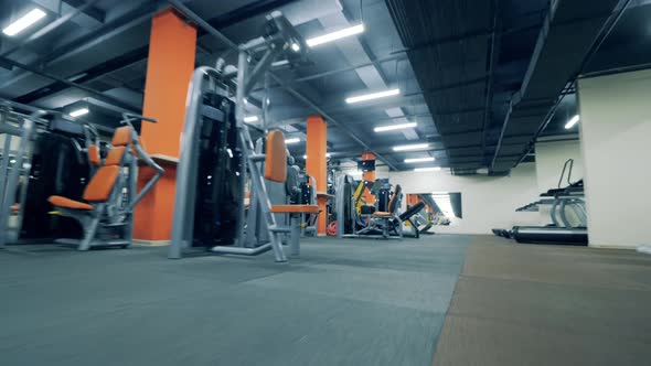 Equipped Fitness Center with No Visitors in It